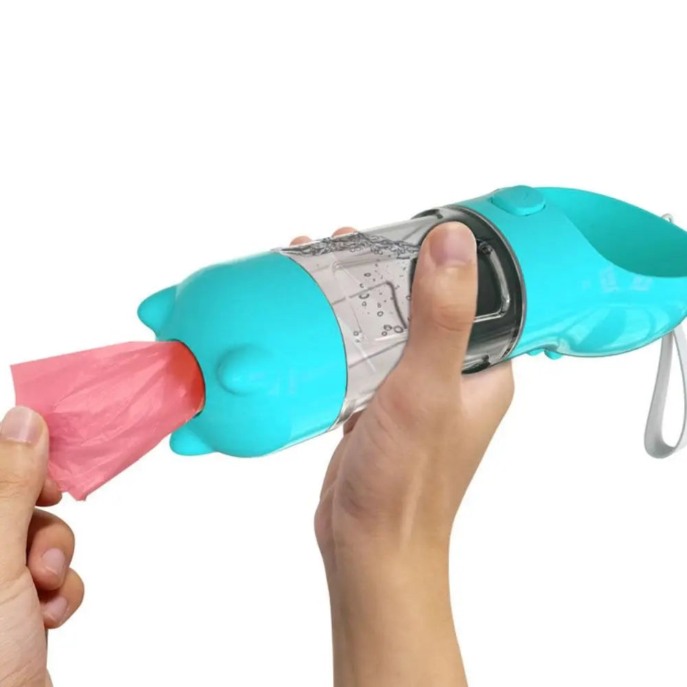 Dispensador 4 en 1 para perros y gatos – Botella de agua, comedero, y pala con bolsa integrada