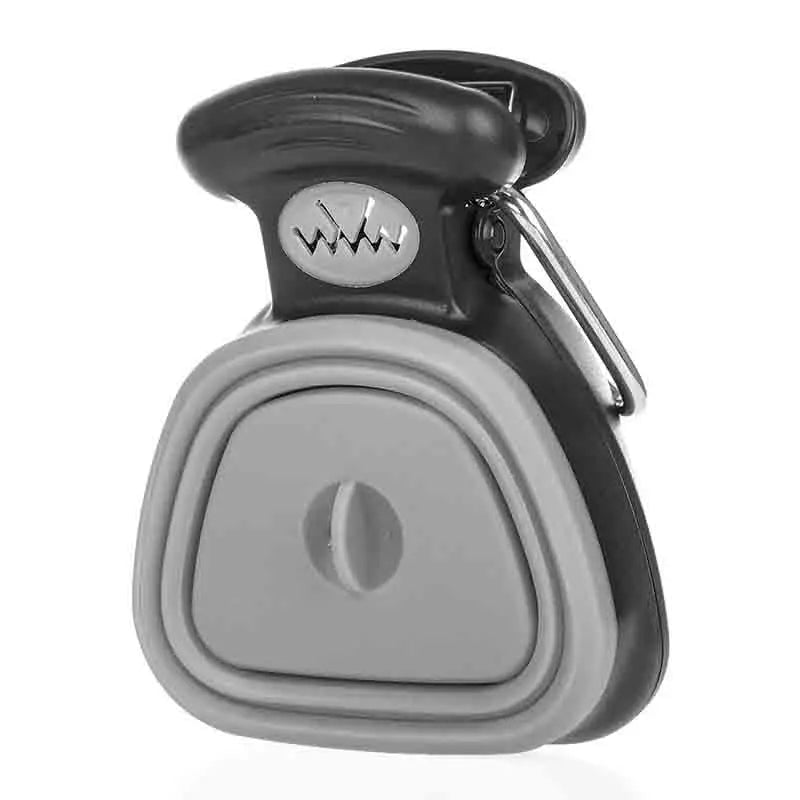 Recogedor y dispensador de bolsas para excrementos de perro, plegable